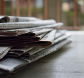 selective focus photography of magazines